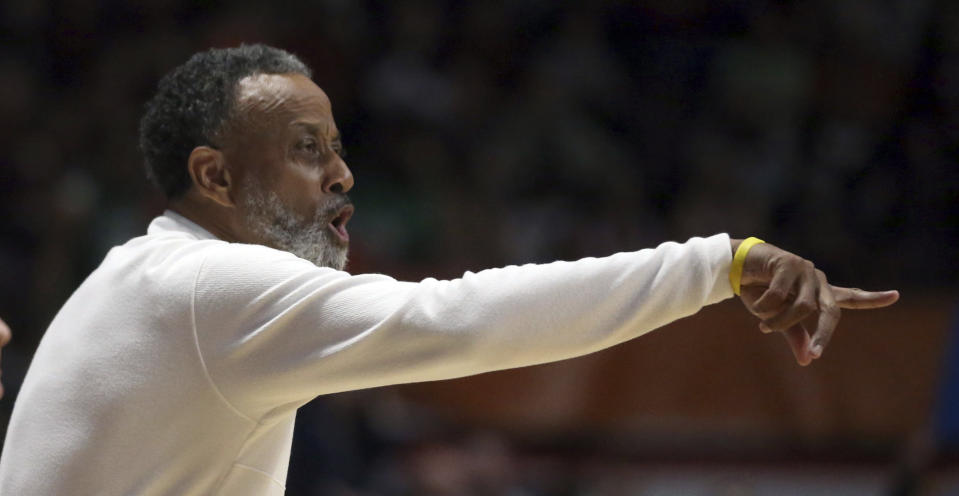 Virginia Tech coach Kenny Brooks gestures during the first quarter of the team's first-round college basketball game against Chattanooga in the women's NCAA Tournament, Friday, March 17, 2023, in Blacksburg, Va. (Matt Gentry/The Roanoke Times via AP)