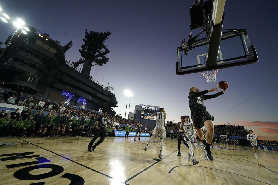 Michigan State forward Joey Hauser (10) shoots during the second half of the Carrier Classic NCAA college basketball game against Gonzaga aboard the USS Abraham Lincoln in Coronado, Calif. Friday, Nov. 11, 2022. (AP Photo/Ashley Landis)