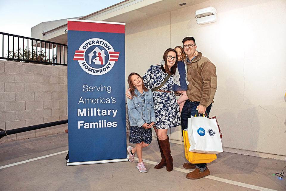 Family together at Holiday Meals for Military Families event 2022