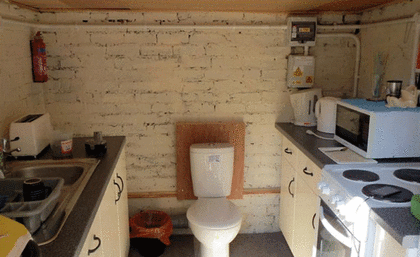 Toilet in kitchen