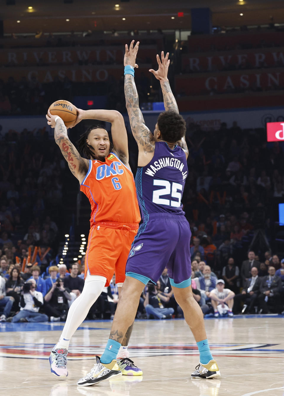 Feb 2, 2024; Oklahoma City, Oklahoma, USA; Charlotte Hornets forward P.J. Washington (25) defends a pass by Oklahoma City Thunder forward <a class="link " href="https://sports.yahoo.com/nba/players/6724/" data-i13n="sec:content-canvas;subsec:anchor_text;elm:context_link" data-ylk="slk:Jaylin Williams;sec:content-canvas;subsec:anchor_text;elm:context_link;itc:0">Jaylin Williams</a> (6) during the second quarter at Paycom Center. Mandatory Credit: Alonzo Adams-USA TODAY Sports