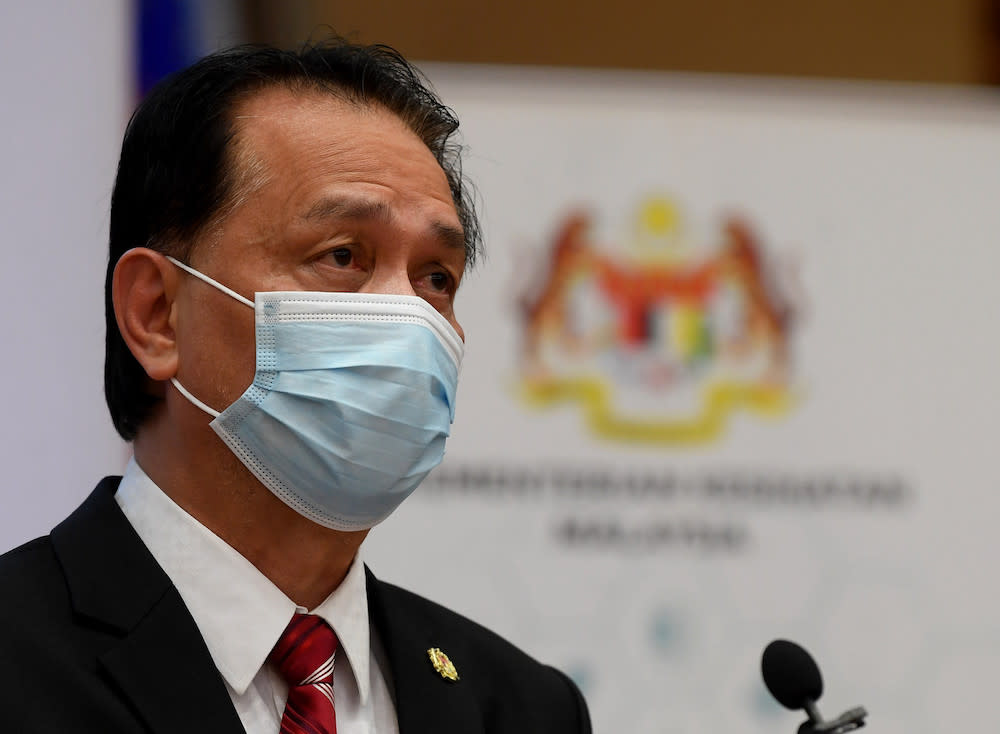 Tan Sri Dr Noor Hisham Abdullah says Malaysia’s daily Covid-19 cases may return to heights not seen since the peak of the ‘third wave’ due to non-compliance with preventive SOPs. — Bernama pic