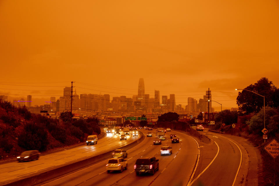 A layer of smoke generated by over two dozen wildfires burning in California created and eerie orange glow over much of the San Francisco Bay Area on Wednesday. (Photo: Anadolu Agency via Getty Images)