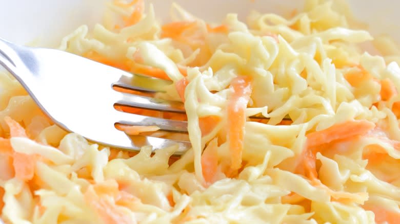 closeup coleslaw metal fork