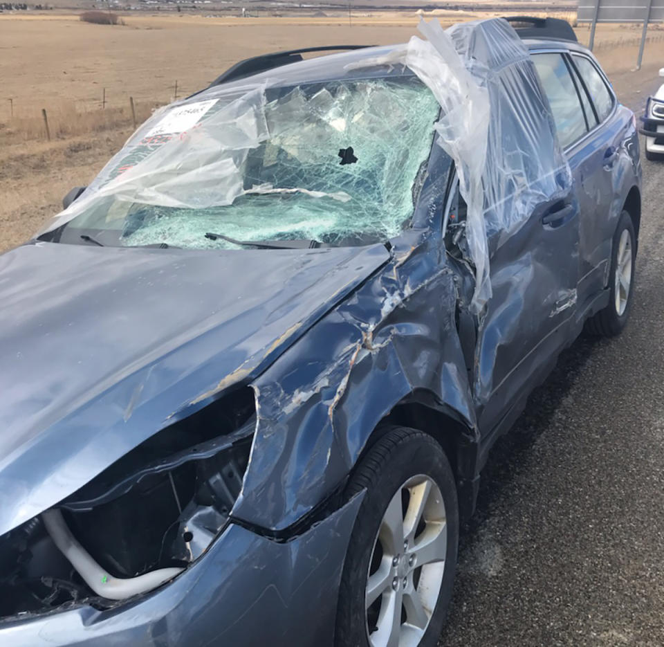 A car with a smashed windshield pictured in Montana.