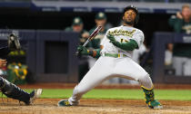 Oakland Athletics shortstop Elvis Andrus (17) avoids being hit by a pitch against the New York Yankees during the ninth inning of a baseball game, Tuesday, June 28, 2022, in New York. (AP Photo/Noah K. Murray)