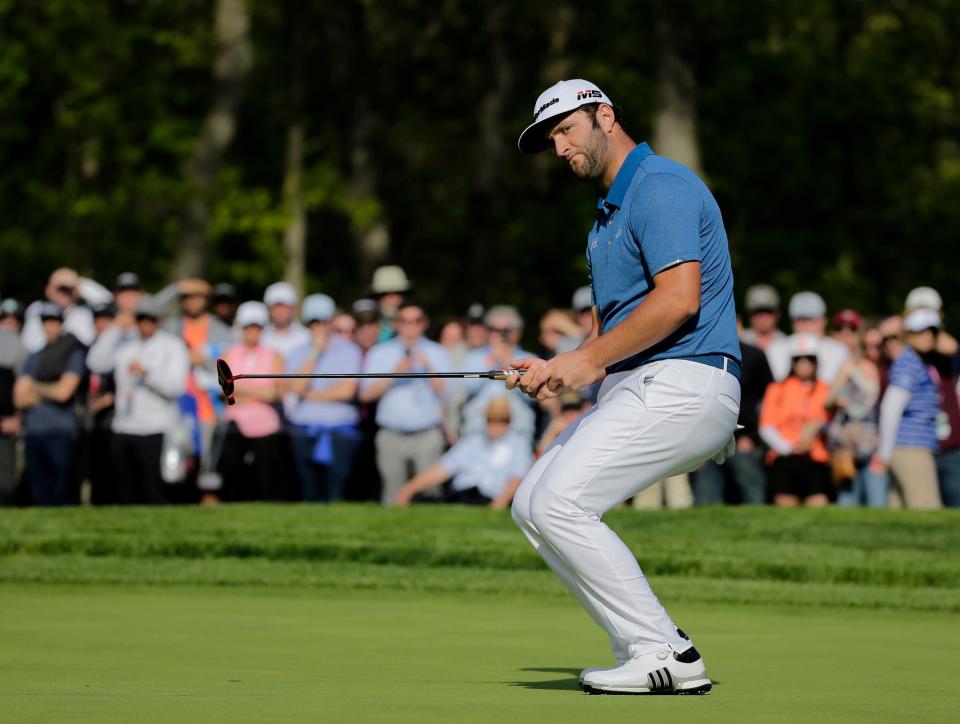 Jon Rahm, of Spain, reacts to a putt on the 13th green during the first round of the PGA Championship golf tournament, Thursday, May 16, 2019, at Bethpage Black in Farmingdale, N.Y. (AP Photo/Seth Wenig)