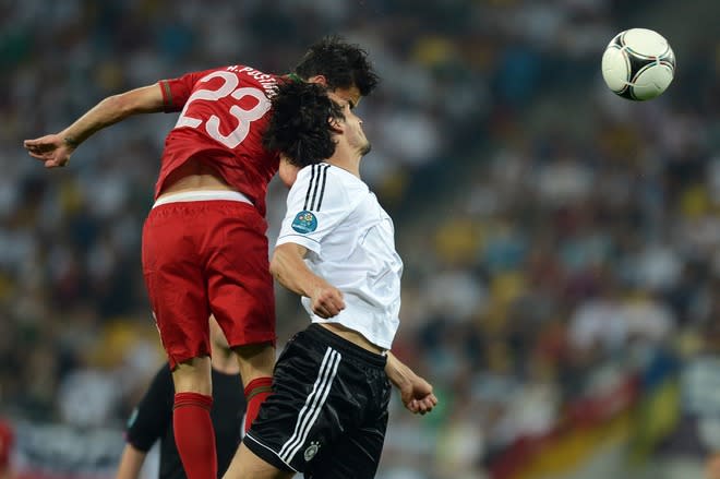 Portuguese forward Helder Postiga (L) vies with German defender Mats Hummels during the Euro 2012 championships football match Germany vs Portugal on June 9, 2012 at the Arena Lviv. AFP PHOTO / JEFF PACHOUDJEFF PACHOUD/AFP/GettyImages