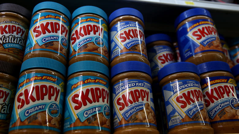 Stacked jars of Skippy Peanut Butter