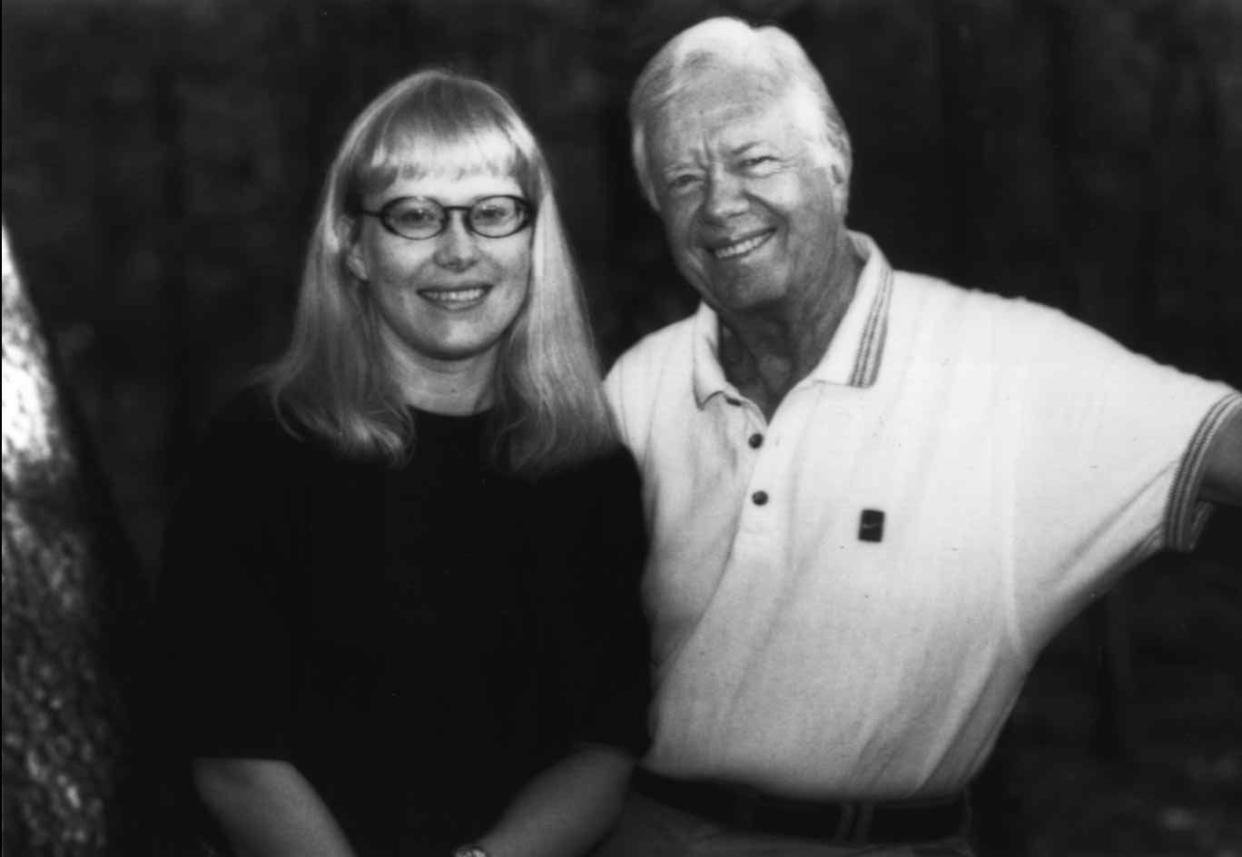 Amy Carter, the illustrator and her father, former President Jimmy Carter, the author of "The Little Baby Snoogle-Fleejer," published by Times Books in 1995, pose on Jan. 15, 1996, in an unreported location.