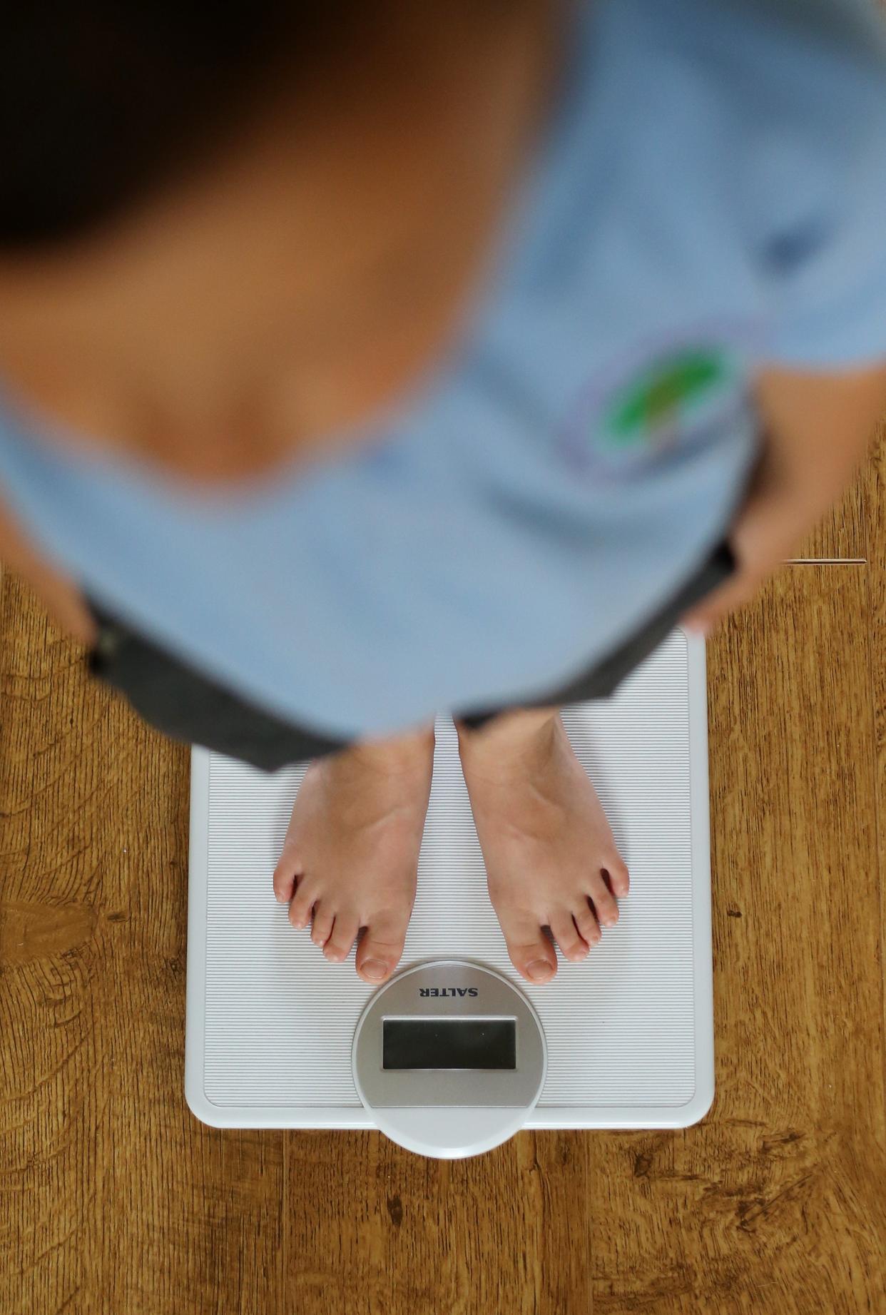 Research has found large differences in body fat mass between richer and poorer children (Gareth Fuller/PA) (PA Archive)