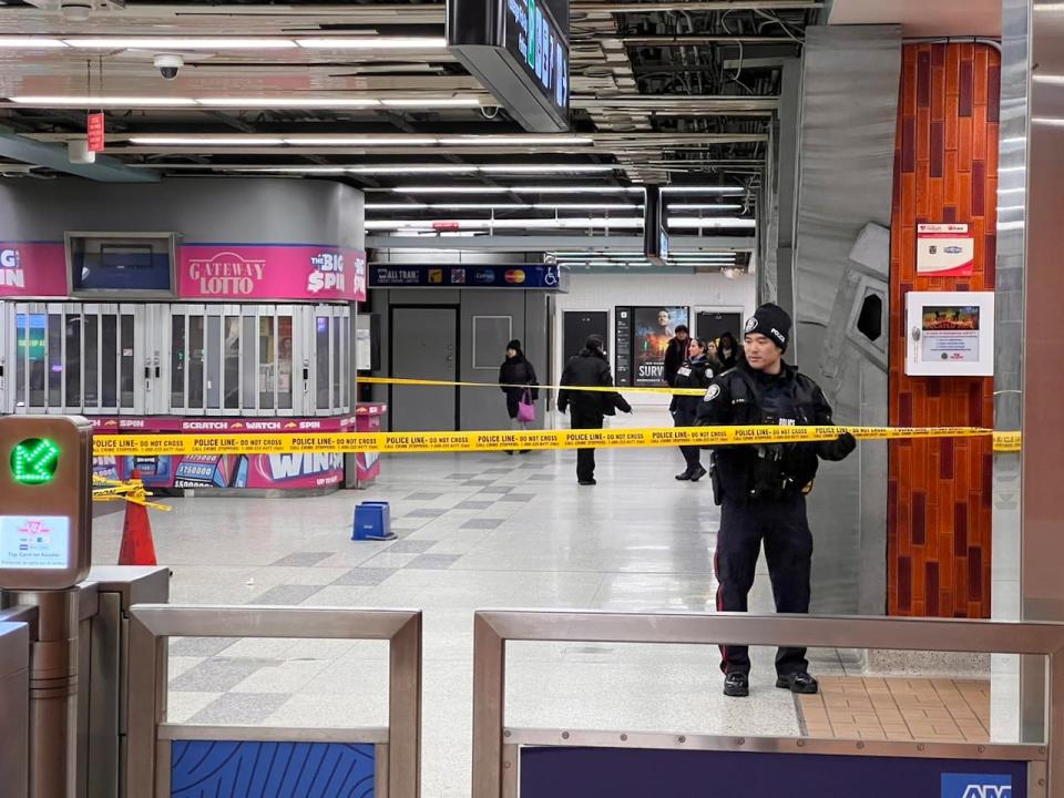 Officers taped off Wilson station after the stabbing. The station was evacuated and trains were bypassing it.