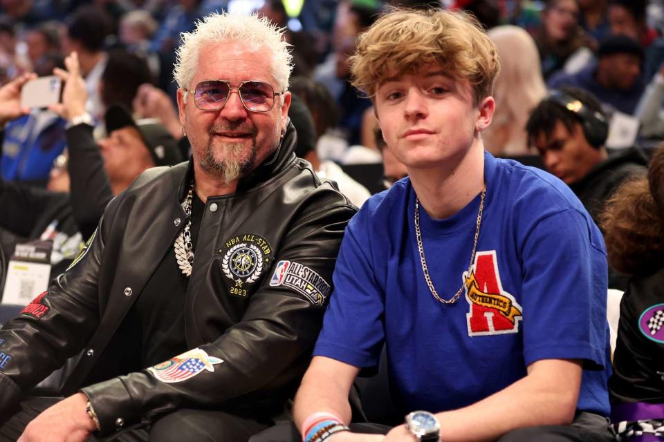 <p>Tim Nwachukwu/Getty</p> Guy Fieri and son Ryder in 2023.