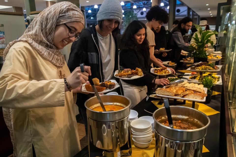 Scripps students Reema Iqbal, Hena Ahmed, a Harvey Mudd student Leila Bensaid, Fares Marzouk,