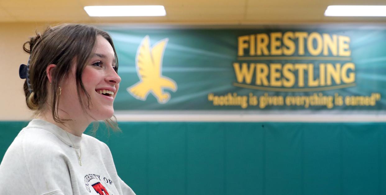 Sarah Meeker, a female wrestler for Firestone High School in Akron, who suffered a concussion this past season, smiles as she discusses getting her first win after taking seven weeks off to recover. Sarah was in the group that was not treated with a cooling therapy protocol tested at Akron Children's Hospital.