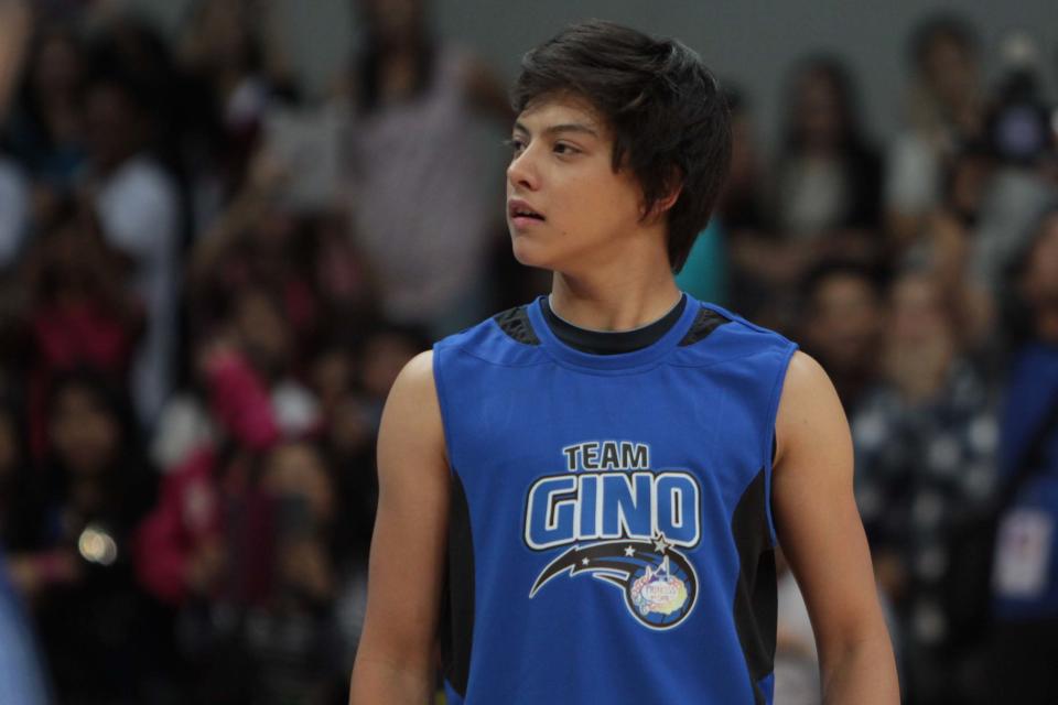 Daniel Padilla plays for team Gino during Princess and I 'The Royal Championship' basketball game held at the Mall of Asia Arena in Pasay city, south of Manila on 20 January 2012.