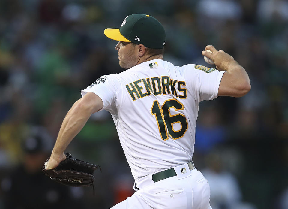 Oakland Athletics pitcher Liam Hendriks works against the New York Yankees in the first inning of a baseball game Tuesday, Sept. 4, 2018, in Oakland, Calif. (AP Photo/Ben Margot)