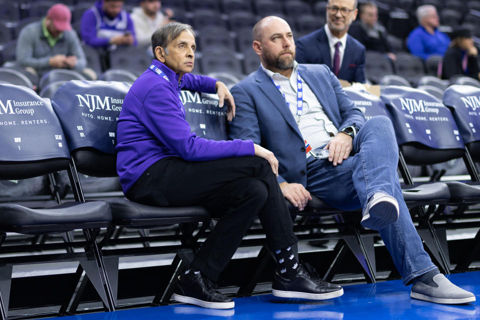 Dec 13, 2022; Philadelphia, Pennsylvania, USA; Sacramento Kings owner Vivek Ranadive (L) and general manager Monte McNair (R) look on during warm ups before a game against the Philadelphia 76ers at Wells Fargo Center. Mandatory Credit: Bill Streicher-USA TODAY Sports