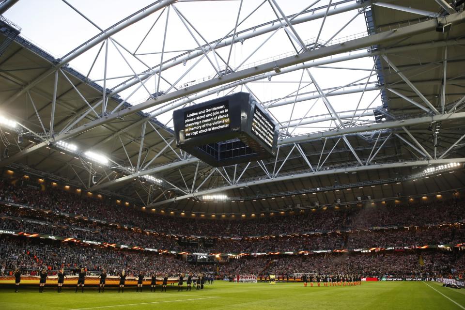 <p>Ajax and Manchester United players take part in a minutes silence in memory of the victims of the Manchester Concert attack prior to the UEFA Europa League Final between Ajax and Manchester United at Friends Arena on May 24, 2017 in Stockholm, Sweden. </p>