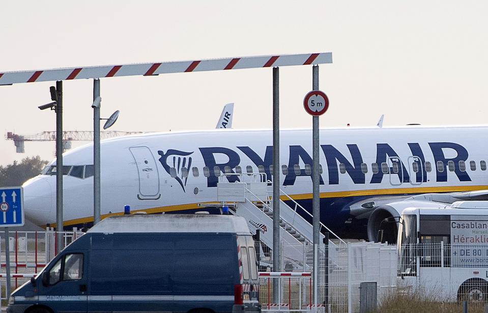 A Ryanair plane sits on the tarmac at the Bordeaux-Merignac airport in southwestern France, after being impounded by French authorities, Friday, Nov. 9, 2018. Storms, strikes, computer failures _ you can now add "your plane has been seized by the government" to the list of things that can delay your flight. (AP Photo)