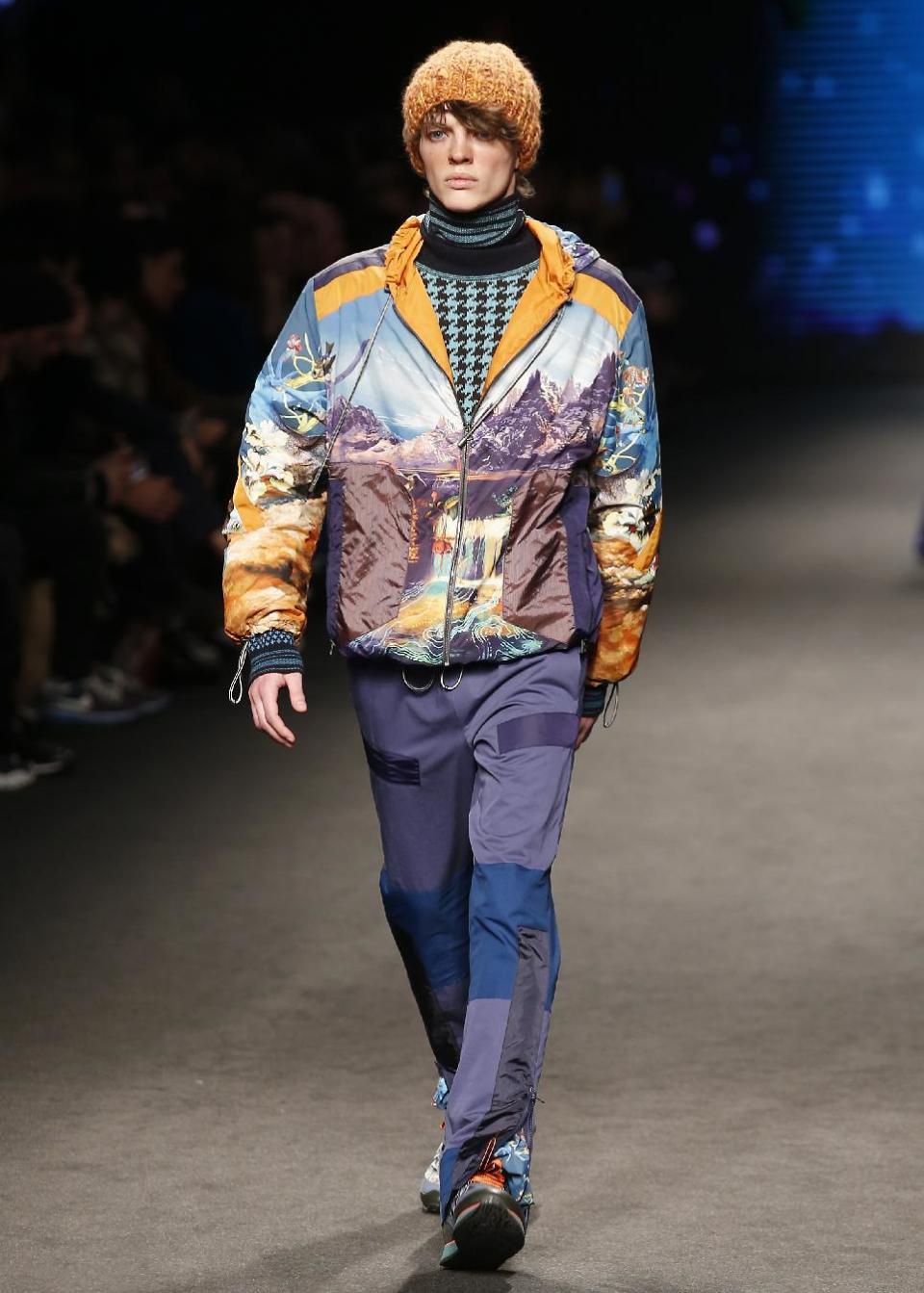 A model wears a creation for Etro men's Fall-Winter 2017-2018 collection, part of the Milan Fashion Week, unveiled in Milan, Italy, Monday, Jan. 16, 2017. (AP Photo/Antonio Calanni)