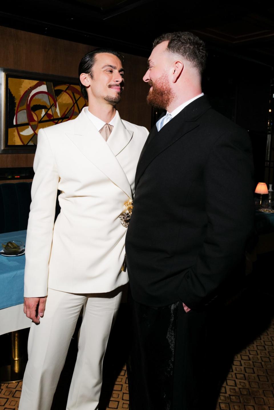 Christian Cowan and Sam Smith at Burberry’s after party (Sansho Scott/BFA.com)