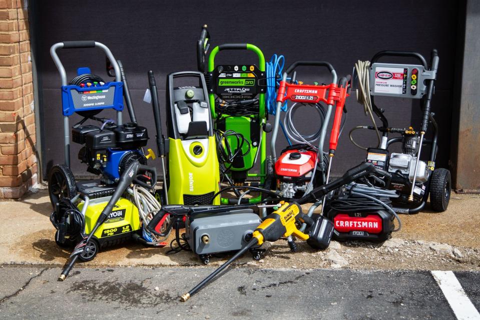 best pressure washers tested group shot against garage door