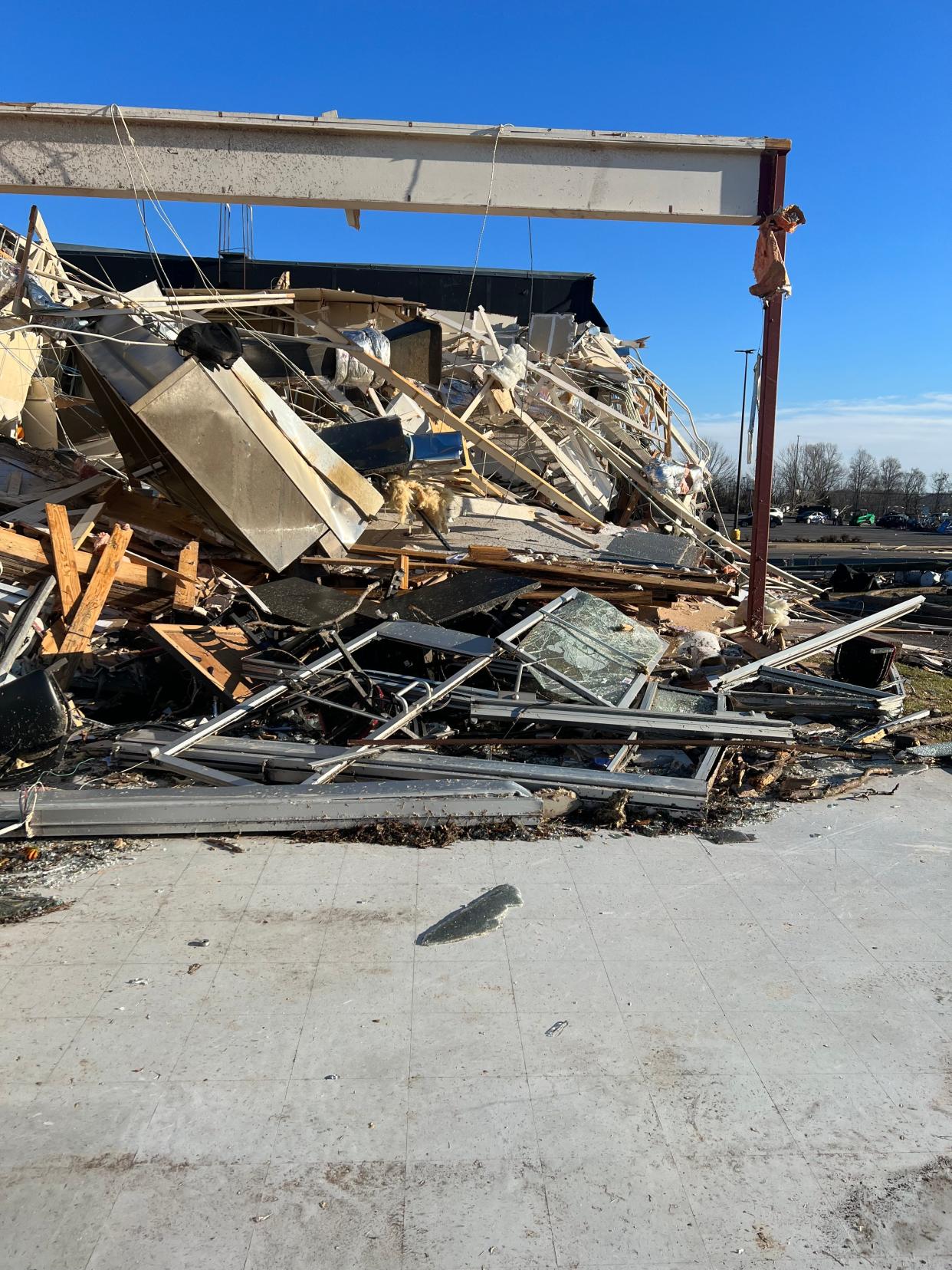 Employees at the Springfield location of Jet's Pizza on Memorial Boulevard sheltered in a nearby grocery store seconds before Saturday's tornado destroyed the business.