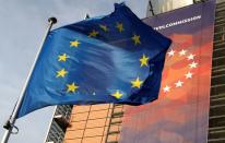 FILE PHOTO: A European Union flag flies outside the European Commission headquarters in Brussels