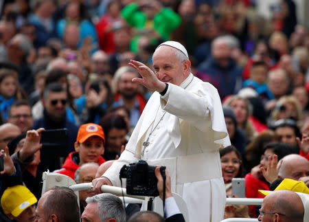 Pope Francis greets crowds as he arrives for the weekly general audience at the Vatican, April 3, 2019. REUTERS/Yara Nardi