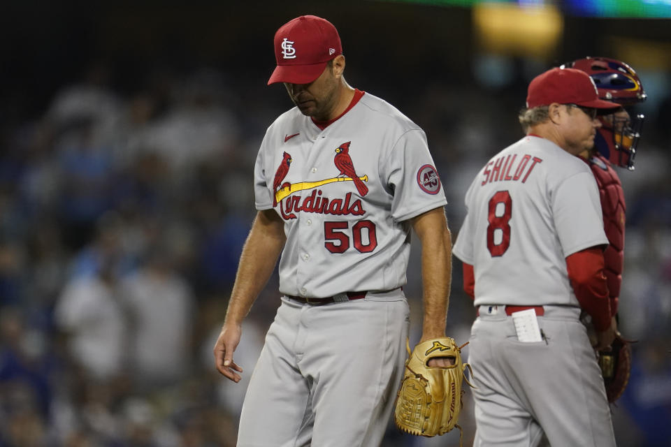 St. Louis Cardinals starting pitcher Adam Wainwright (50) leaves the game during the sixth inning of a National League Wild Card playoff baseball game against the Los Angeles Dodgers Wednesday, Oct. 6, 2021, in Los Angeles. (AP Photo/Marcio Jose Sanchez)