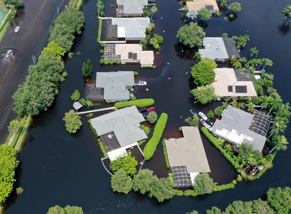 An overhead view Wednesday afternoon, Aug. 7, 2024, of Sarasota County's Laurel Meadows subdivision that has been flooded for days.