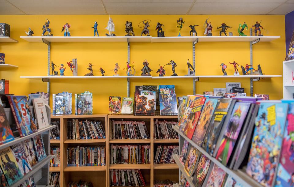 Comics, trade paperbacks and character figures fill the shelves at the new location of Zeek’s Comics and Games in the Cherry Tree Shopping Center in Washington.