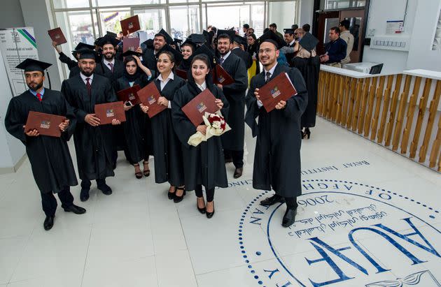 More than 100 Afghan students from the American University of Afghanistan celebrate after receiving their diplomas at a graduation ceremony on campus on May 21, 2019, in western Kabul, Afghanistan. (Photo: Scott Peterson via Getty Images)