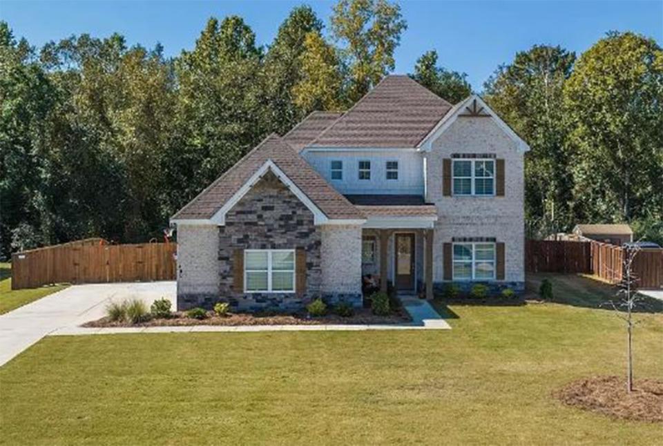 The home at 400 Abby Lane in Millbrook's Kamden's Cove provides four bedrooms and three and a half bathrooms within 2,974 square feet of living space. The property is for sale for $475,900.