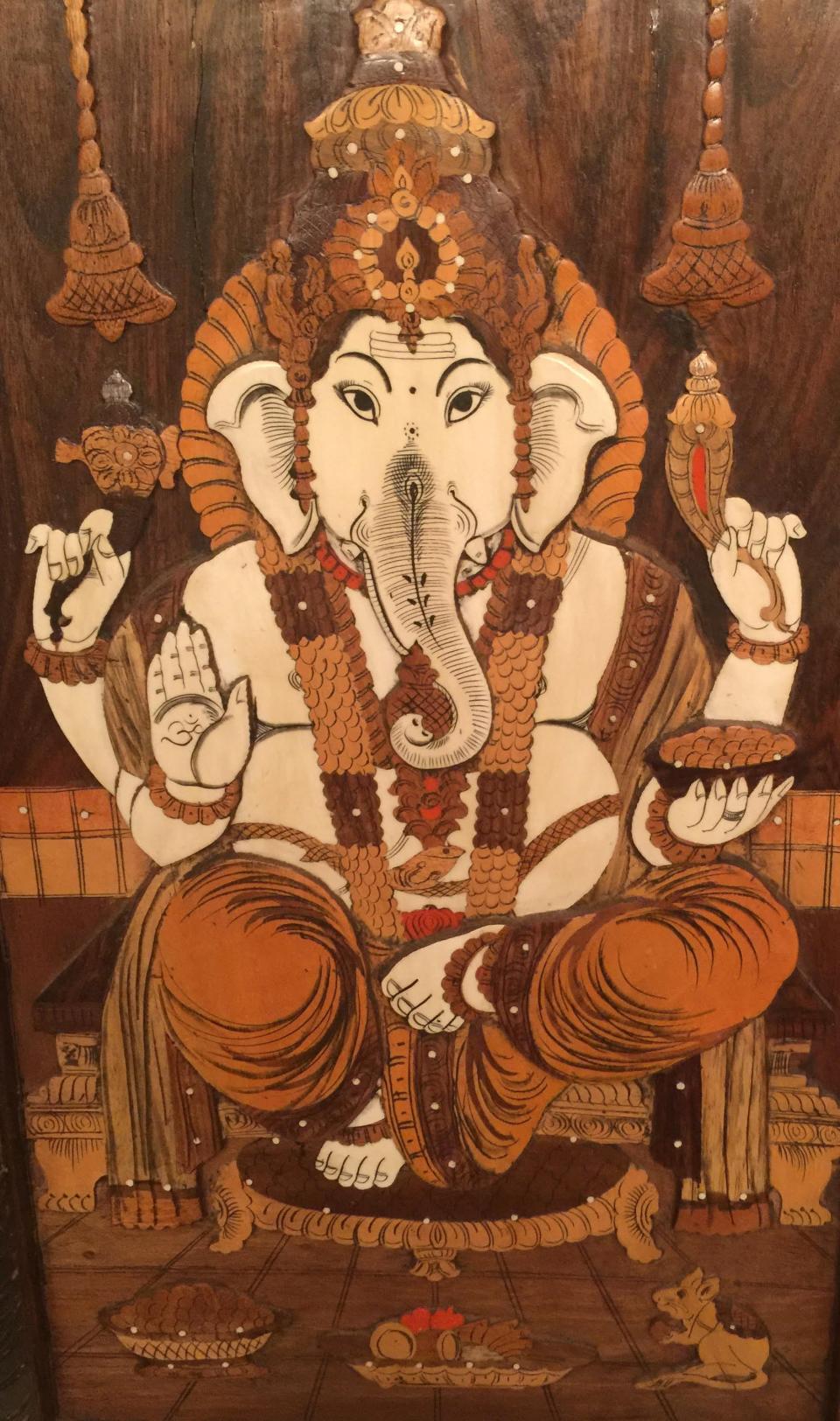 A Hindu deity, Lord Ganesha, is depicted