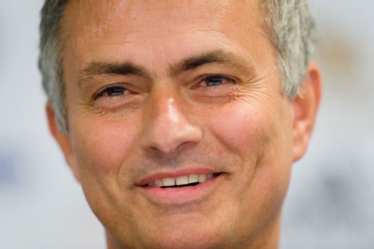 Chelsea football club's new manager Jose Mourinho addresses a press conference at Stamford Bridge in west London, on June 10, 2013. A more cautious Mourinho transformed himself into "the Happy One" on Monday as he faced the media for the first time since he began his second spell as manager of Premier League giants Chelsea