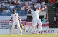 Cricket - West Indies v England - Second Test - National Cricket Ground, Grenada - 24/4/15 England's Chris Jordan appeals for the wicket of West Indies' Kraigg Brathwaite Action Images via Reuters / Jason O'Brien Livepic