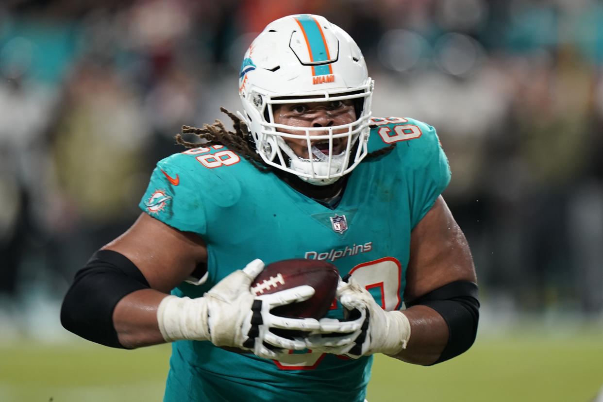 Miami Dolphins guard Robert Hunt (68) carries the ball during the second half of an NFL football game against the Baltimore Ravens, Thursday, Nov. 11, 2021, in Miami Gardens, Fla. (AP Photo/Wilfredo Lee)