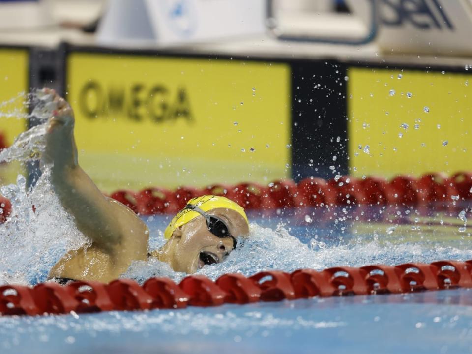 Summer McIntosh competes in the women's 400-metre freestyle event at the Toronto Pan Am Sports Centre on Tuesday. McIntosh set the world record during the race with a time of 3:56.08, supplanting Australia's Ariarne Titmus. (Michael P. Hall/Swimming Canada - image credit)