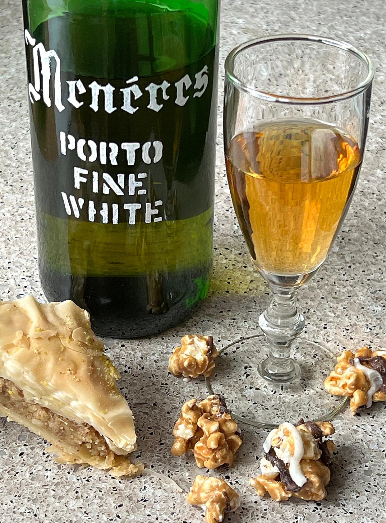 Menéres white port pairs perfectly with baklava and American Classic Snack Co.'s sea salt turtle pecan flavor of popcorn.