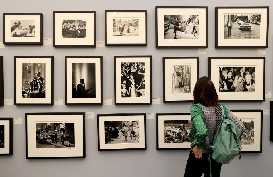 <p>LONDON, ENGLAND - SEPTEMBER 08: Guests look at exhibits during the "Photo London" exhibition press preview at Somerset House on September 08, 2021 in London, England. (Photo by Chris Jackson/Getty Images)</p>
