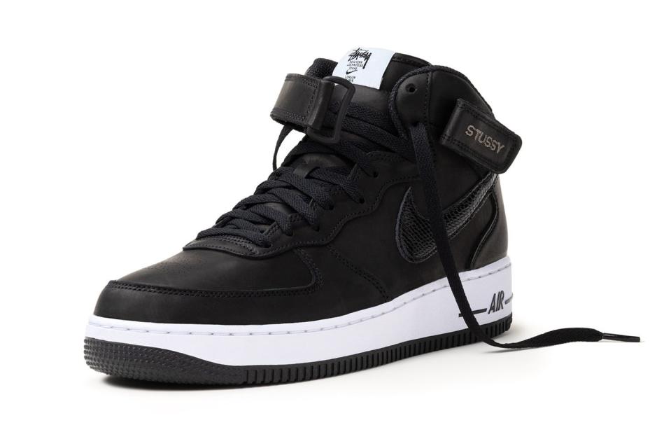 The Stüssy x Nike Air Force 1 Mid in the “Black” colorway. - Credit: Courtesy of Stüssy