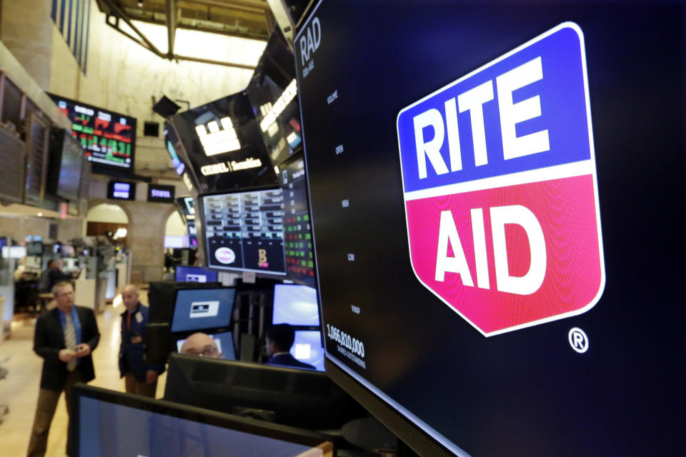 <p> The logo for Rite Aid is displayed above a trading post on the floor of the New York Stock Exchange, Thursday, Aug. 9, 2018. Rite Aid and the grocer Albertsons called off an agreement to become a single company with the deal facing shaky prospects in a shareholder vote.(AP Photo/Richard Drew) </p>