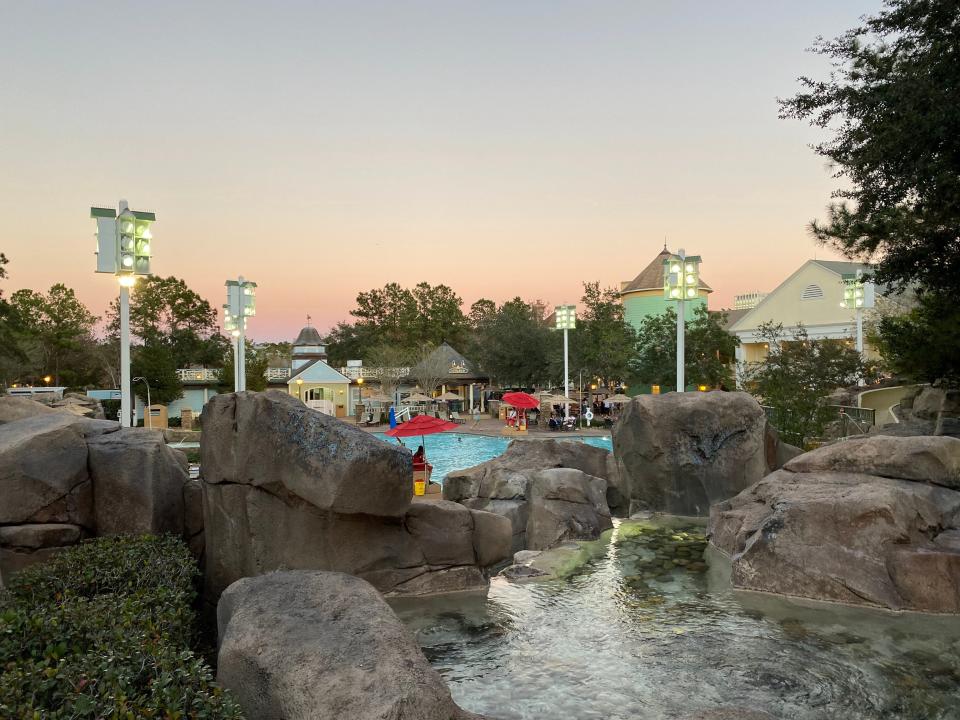 one of the pools at saratoga springs at dusk