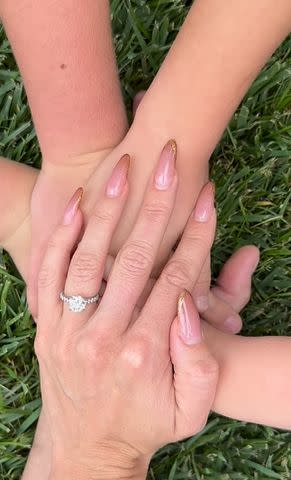 <p>Sharna Burgess/Instagram</p> Sharna Burgess shares a video of her new engagement ring