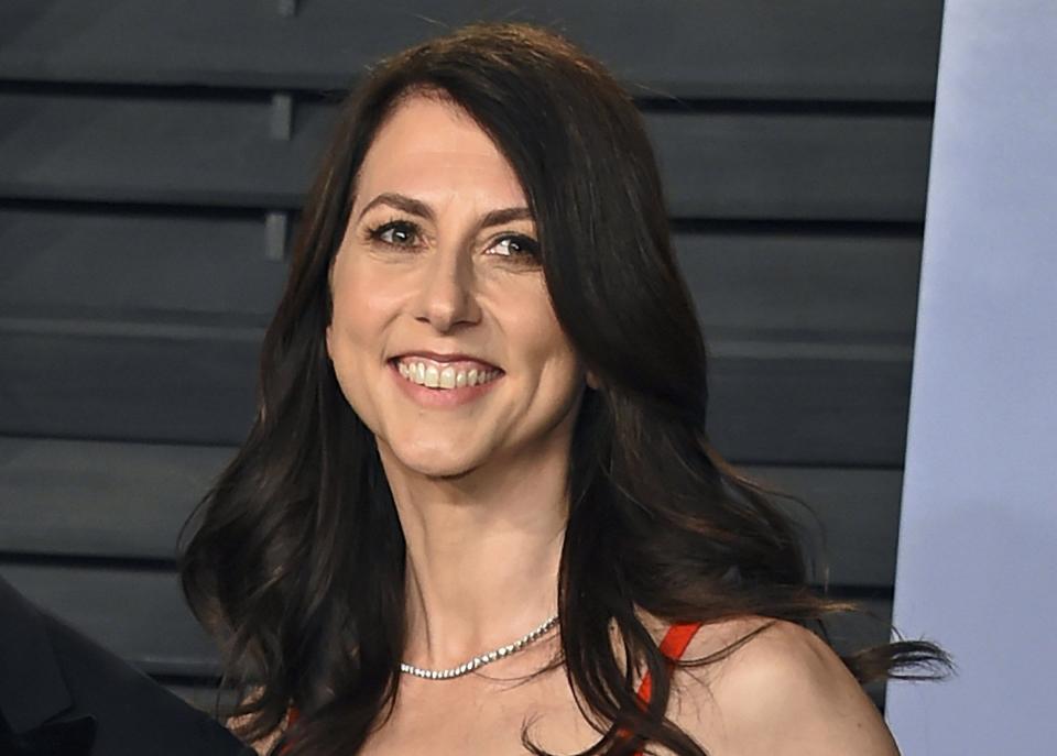 FILE - In this March 4, 2018 file photo, then-MacKenzie Bezos arrives at the Vanity Fair Oscar Party in Beverly Hills, Calif.  Scott, ex-wife of Amazon founder Jeff Bezos, this week donated $4.2 billion to organizations across the country, including $10 million to the United Way of Palm Beach County. The donation makes it the largest gift in the non-profit's 91-year history.  Scott said she wants to help people suffering from the economic effects of the pandemic. (Photo by Evan Agostini/Invision/AP, File)