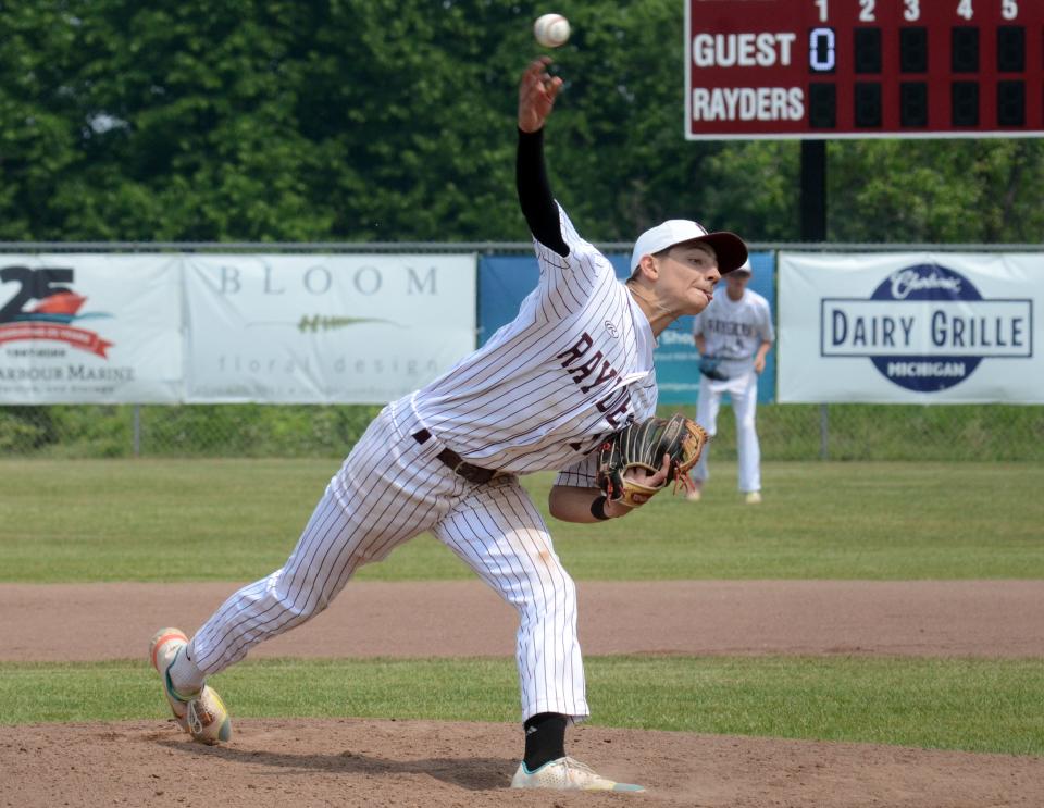 Charlevoix sophomore Owen Waha sends a pitch to the plate in the district championship game Saturday in Charlevoix.