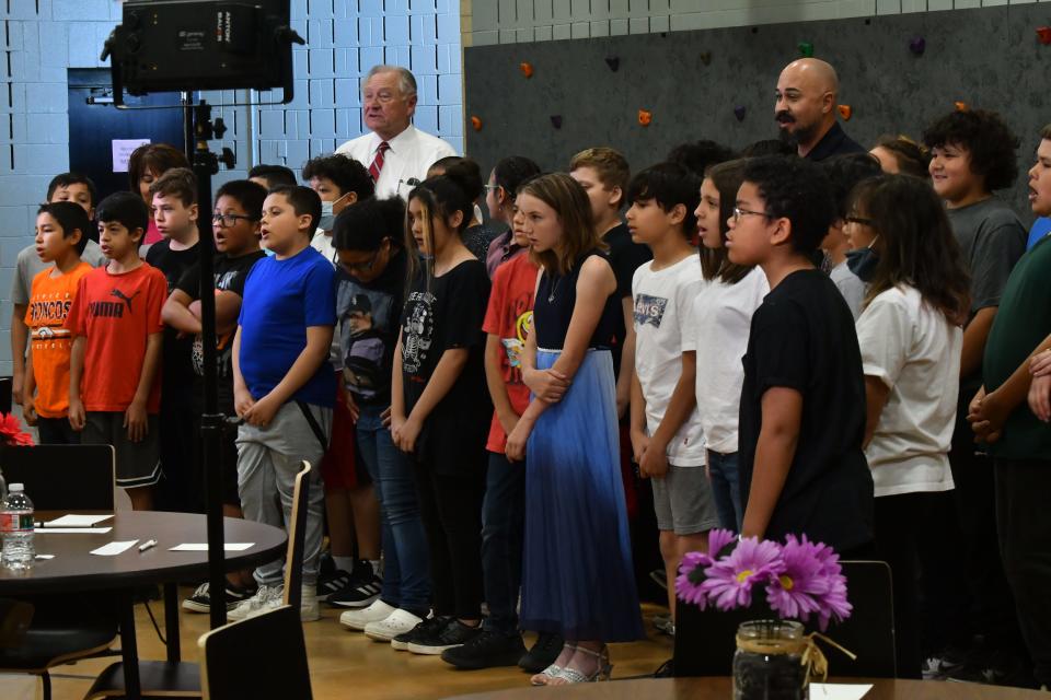 Minnequa Elementary School students and community leaders sing "Pueblo is Our Home Sweet Home," the official jingle of the Gateway to the Southwest Project.