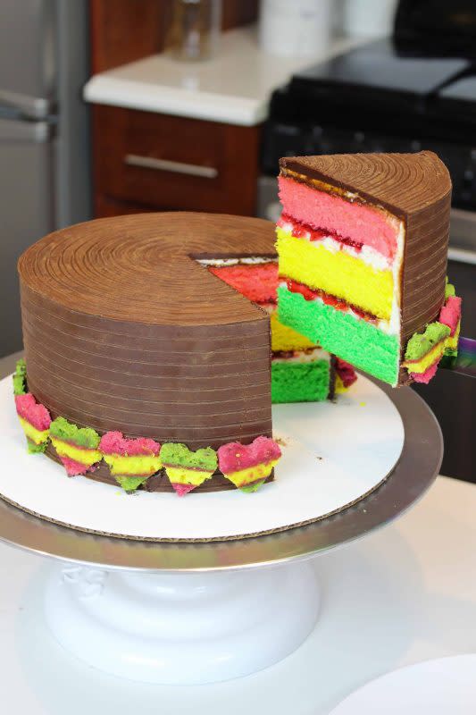<p>Chelsweets</p><p>Rainbow cookies are the inspiration for this week’s cake recipe. In fact, this rainbow cookie cake is pretty much just one massive rainbow cookie!</p><p><strong>Get the recipe: <a href="https://chelsweets.com/rainbow-cookie-cake/" rel="nofollow noopener" target="_blank" data-ylk="slk:Rainbow Cookie Cake;elm:context_link;itc:0;sec:content-canvas" class="link rapid-noclick-resp"><em>Rainbow Cookie Cake</em></a></strong></p>